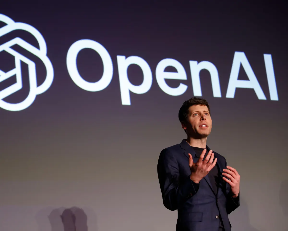 OpenAI CEO Sam Altman speaking at an event.