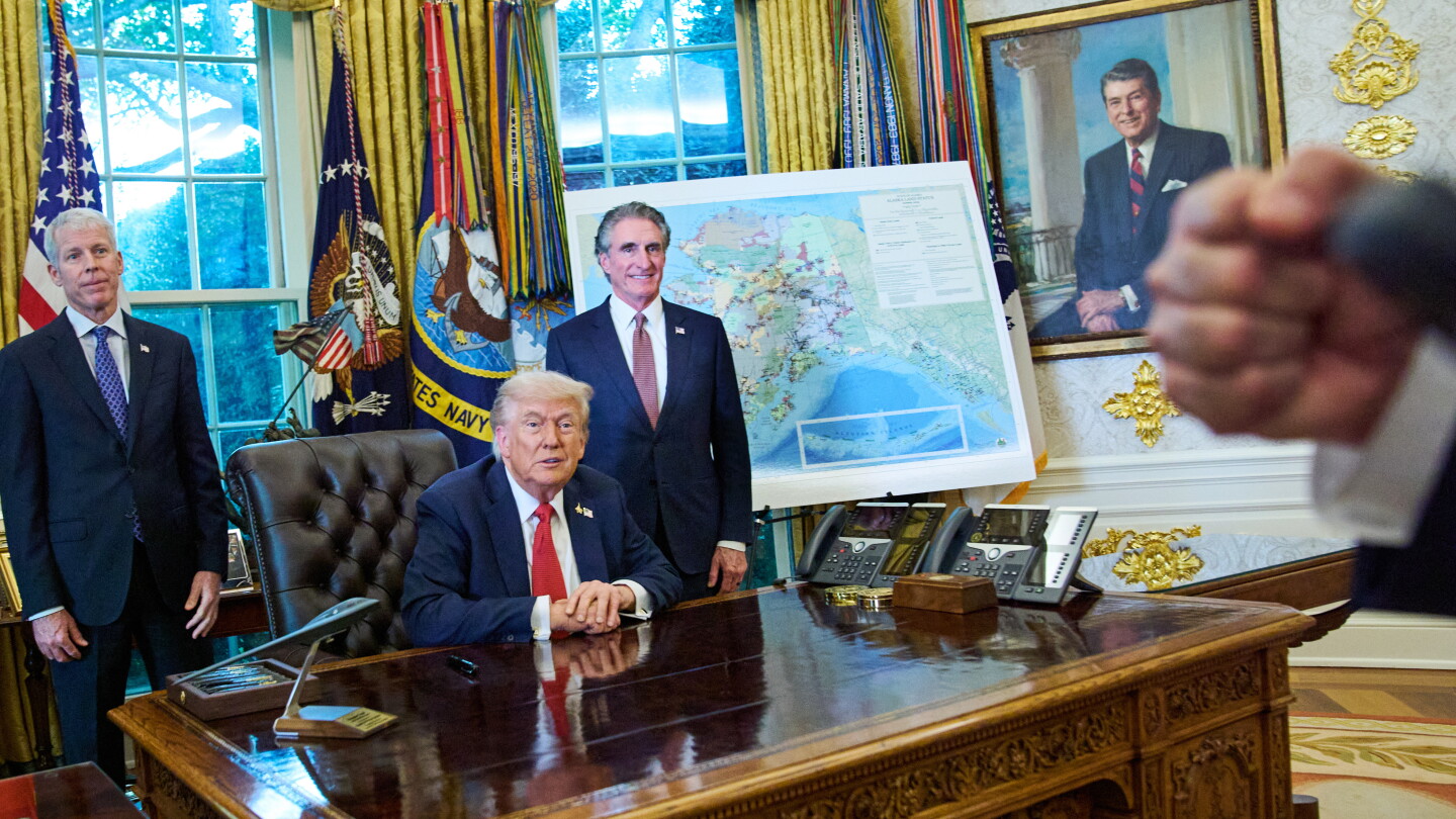 President Donald Trump appears with Energy Secretary Chris Wright and Interior Secretary Doug Burgum at a White House event.