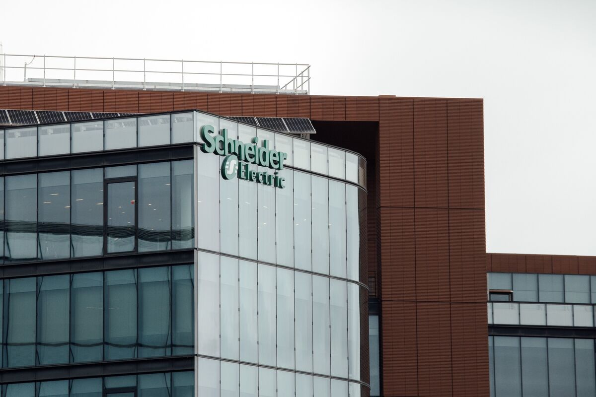 Schneider Electric logo on the facade of a company building.