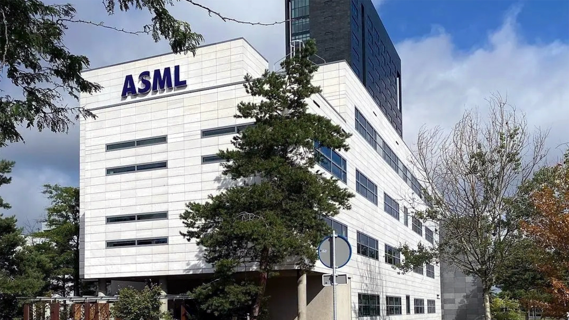 ASML office building with the company's blue logo on the facade.