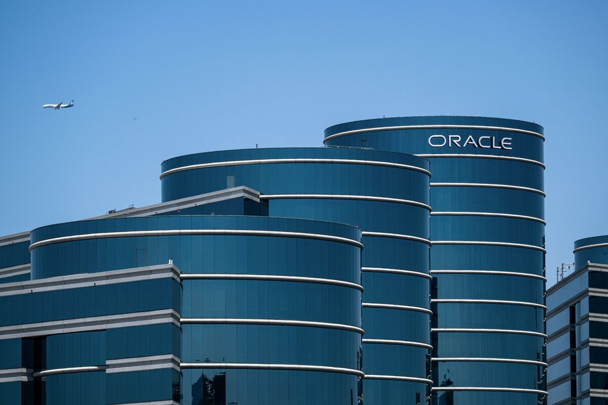 Oracle office buildings under a clear blue sky.