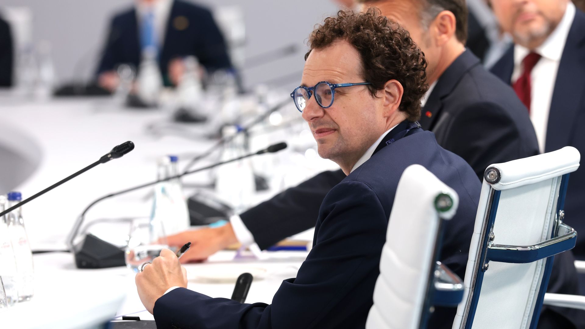 Dario Amodei seated at a conference table with a microphone at the G7 in June 2026. File photo.
