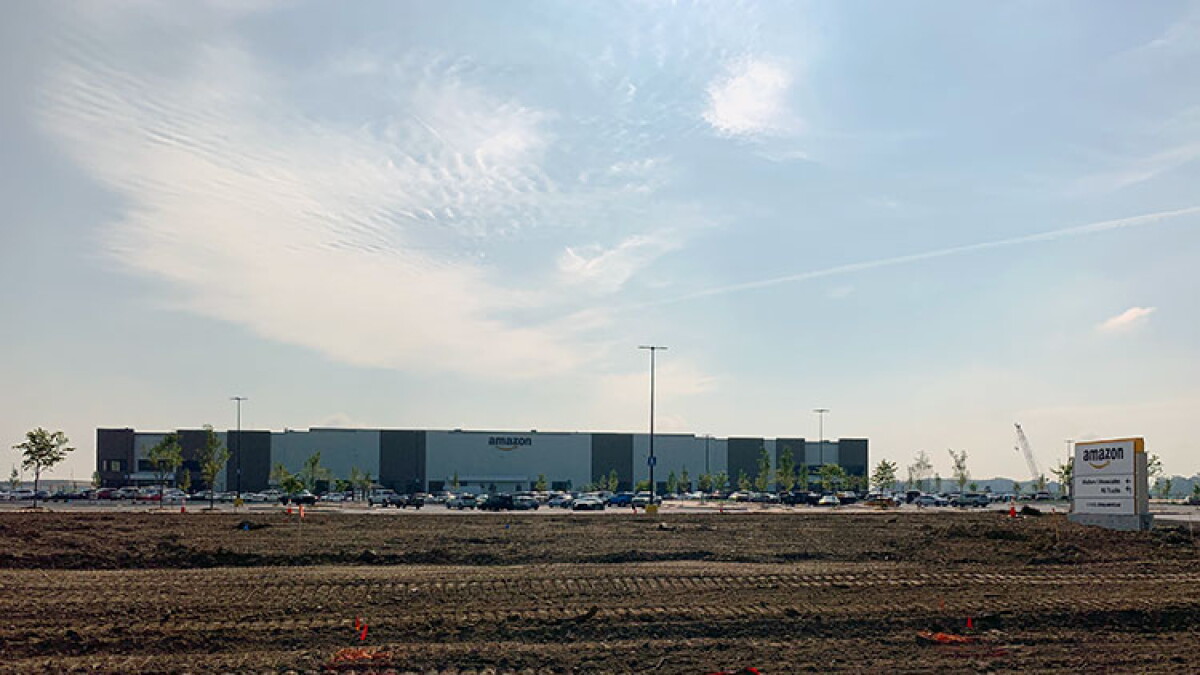 Amazon's logo on the exterior of a company facility in Greenwood, Indiana.
