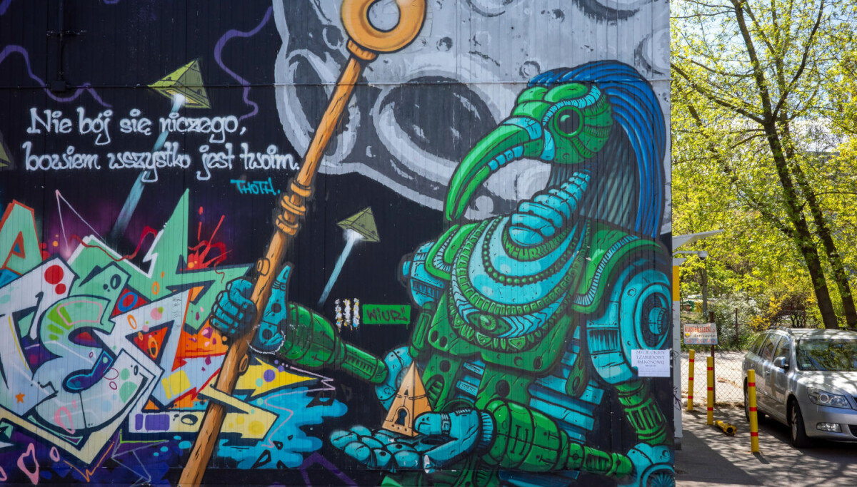 A mural of the Egyptian god Thoth accompanied by text about ownership.